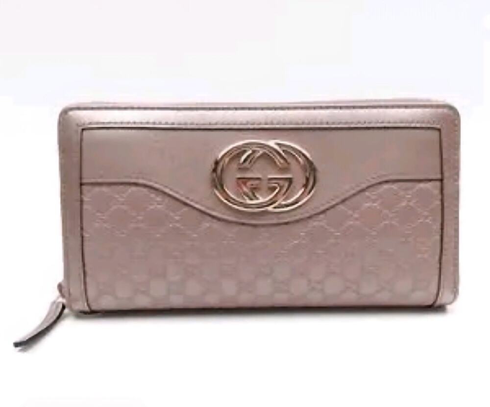 Gucci Interlocking G Zip-Around Wallet in Metallic Pink Guccissima leather